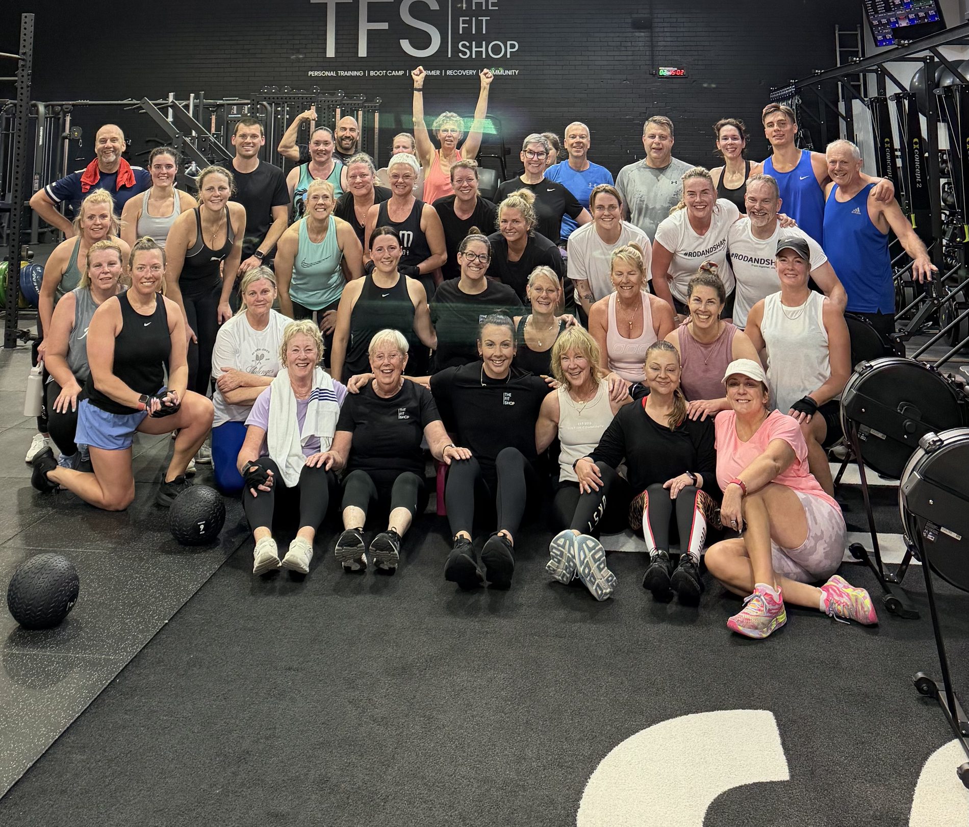 The Fit Shop community smiling together at the gym